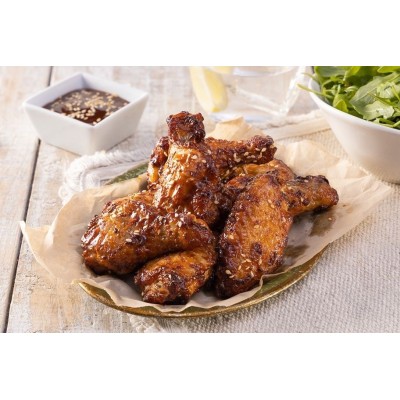 ALITAS DE POLLO ASADAS ASADAS CON SALSA BBQ 1 KG.